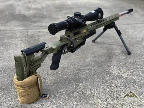A bolt gun supported by a rear bag.