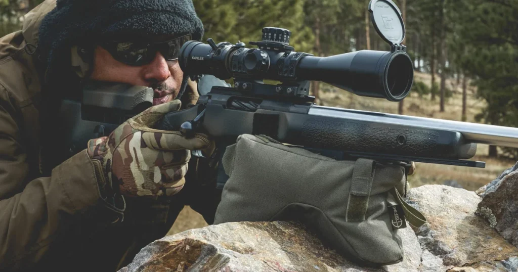A person shooting from a support bag. 